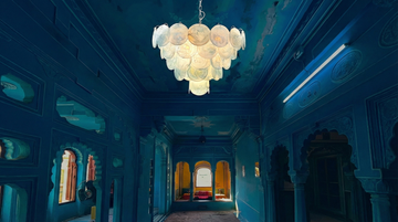 🌊 Capturing the Ocean’s Glow: The Blue Murano Disc Chandelier