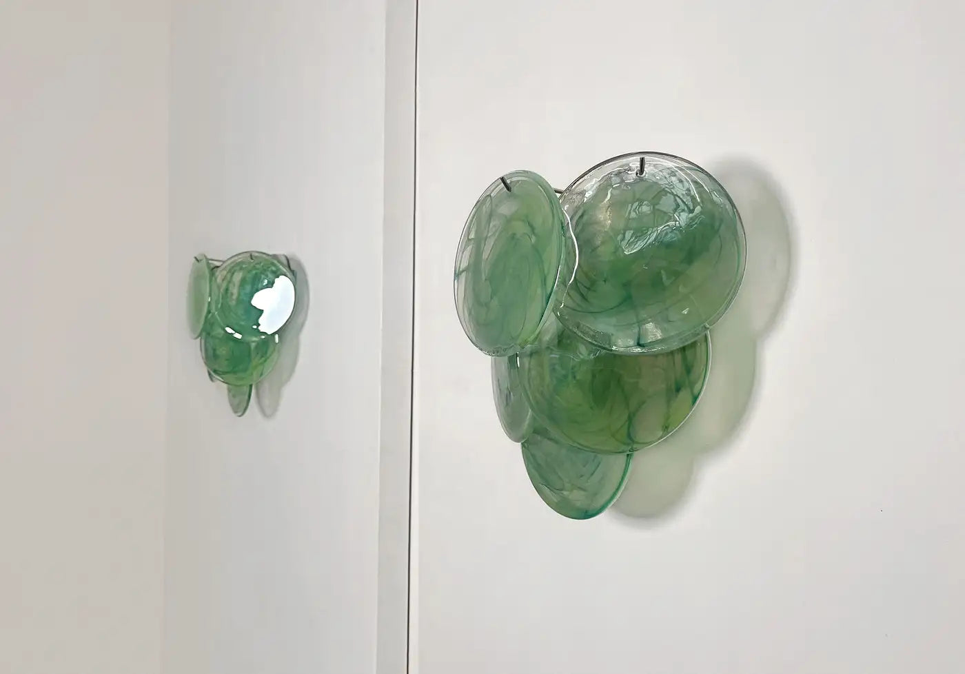 Pair of glass wall sconces - 6 alabaster green disks